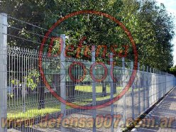Instalación de concertina lineal de 3 líneas sobre reja, zona Pacheco.