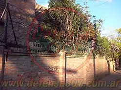 Instalación de concertina plana de 45 cm en doble capa pintada de negro. Zona San Isidro.