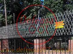 Concertina romboidal de 50 cm sobre muro. Zona CABA.