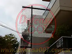 Instalación de concertina romboidal en balcón. Zona CABA.