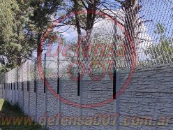 Instalación de concertina romboidal de 100 cm sobre muro premoldeado. Zona Luján.